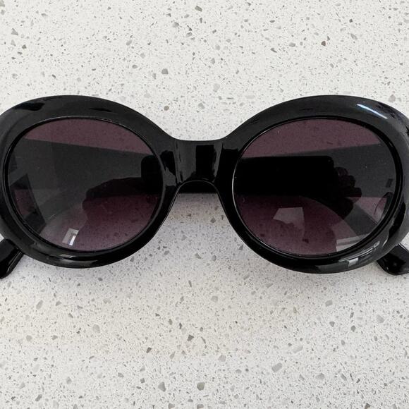 Oscar de la Renta Black Oval Sunglasses Purple Lenses